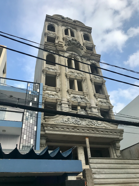 A heavy faux-colonial structure in Ho Chi Minh City, Vietnam
